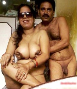 Desi Couple pressing big boobs